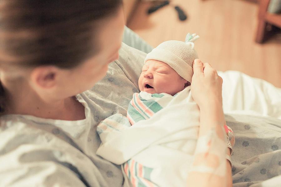Mother holding a newborn